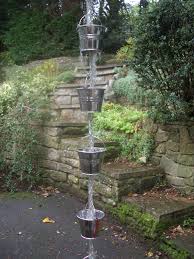 Suspended spigot garden bucket fountain : Mini Bucket Rain Chain 5 Steps With Pictures Instructables