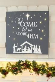 Mark your design layout on the back of canvas and gently press an awl through the canvas … Diy Lighted Christmas Canvas Art The Frugal Homemaker