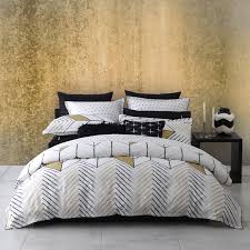 Click any image for expanded view. Logan Mason Rio Gold Quilt Cover Set White Gold Black Bedroom Pattern Duvet Geometric Inspiration Summer Quilt Cover Sets Quilt Cover Gold Duvet
