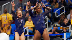 Ucla Gymnast Nia Dennis Has Crowd Falling Crazy In Love With Her Beyonce Inspired Routine In 2020 Gymnastics Routines Gymnastics Gymnastics Floor Routine