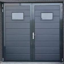Die tür passend zum tor, im gleichen design, in gleicher farbe; Garagenturen Mewald Gesmbh