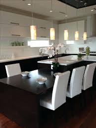 Kitchen islands modern kitchen island table with seating a large. 13 Kitchen Island Dining Table Ideas How To Make The Kitchen Island Dining Kitchen Island Dining Table Kitchen Island Table Kitchen Island Table Combination
