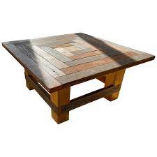 And if you want an industrial or farmhouse vibe in a round wood farmhouse coffee table with storage: Geometric Square Rustic Wood Coffee Table For Sale At 1stdibs