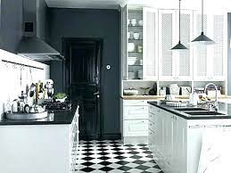 The white octagon and black dot (diamond) combination is timeless. Black And White Kitchen Tiles Design Mass Idea