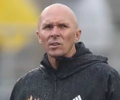 Clinton hires John Carr as new head football coach