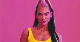 Her eponymous debut album was released in 2017 and contained seven singles. Dua Lipa Let S Get Physical Workout Music Video Watch