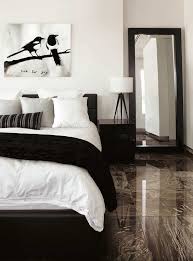 Black And White Is A Classic Color Combination And For A Good Reason The Strong Neutrals Serve As A So Interior Design Bedroom Tile Bedroom Bedroom Interior