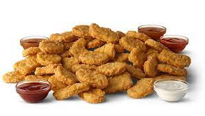 Mcdonald S Chicken Mcnuggets Are Made With Juicy And Tender 100 White Meat Chicken With No Artificial Preservati Mcnuggets Chicken Mcnuggets Dog Food Recipes