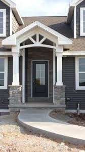 These styles started popping up in the this cottage is full of craftsman details and more. Craftsman Porch Craftsman Exterior Other Metro By Roc Building Solutions Facade House Craftsman Porch Craftsman Exterior