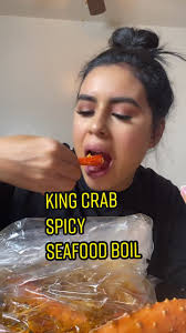 Delicious King Crab Legs with Spicy Seafood Boil Sauce
