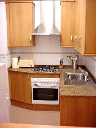 Get Design Inspiration From These 50 Charming Small Kitchens Smallkitchen Kitchendesign Small Kitchen Design Apartment Kitchen Design Small Simple Kitchen