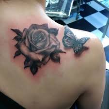 The use of color in this rose tattoo design sets it apart from the rest by creating contrast between the two flowers. Butterflies Tattoos Askideas Com