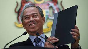 Malaysian prime minister muhyiddin yassin (right) attends a special parliamentary sitting to brief the legislature on the country's coronavirus recovery plan. Malaysia S Muhyiddin Eyes Unprecedented Snap Election To Vanquish Mahathir Financial Times