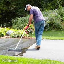 Asphalt companies charge about $1,000 to dig out the old portion and install a new apron. How To Seal An Asphalt Driveway Diy Family Handyman