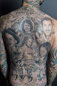 Examples of these catholic travis barker tattoos include a portrait of jesus above his left biceps and the sacred heart. Travis Barker Talks Tattoos And Pain Gq