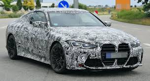 bmw s new 2021 m4 coupe drops more camo but not the huge nostrils carscoops m4 coupe bmw m4 coupe bmw m4