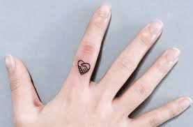 The tattoo is formed by three dots in a triangular formation located on the web of the hand did you see those three dots on that guys hand? yeh, the three dots tattoo, that guy must be latino. 31 Tiny Finger Tattoos That Scream Of Big Things