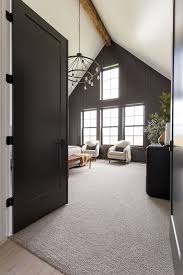 Sign up for color consultation with rugh design today! Sherwin Williams Sw 7069 Iron Ore Black Double Doors In Sherwin Williams Sw 706 Modern Farmhouse Master Bedroom Modern Farmhouse Bedroom Black Modern Farmhouse
