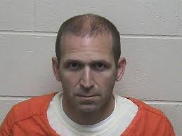 A Wisconsin kayaker accused of faking his death appears in court