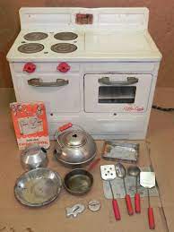 In the 1950s advertisers and retailers idealized the kitchen as the housewife's realm, a symbol of fulfilling domesticity. 130 Best Vintage Play Kitchen 1950s Ideas Toy Kitchen Play Kitchen Vintage Toys