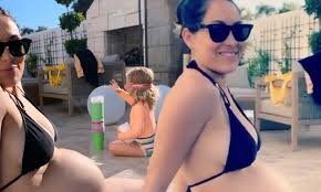Bella & nicole poolside fun. Nikki Bella Posts Images Of Her Twin Sister Brie Showing Off Her Baby Bump Daily Mail Online