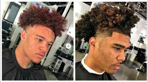 The high fade with a fun mop of curls is a style that won't be passed this is a haircut for black men that breaks the normal mold. Curly Top Taper Fade Compilation Afro Haircut Youtube