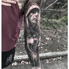 Best Black And Grey Tattoo Artists In The Us Portrait Realism By Chris Nieves Native American Tattoo Sleeve Tattoos Wolf Tattoo Sleeve