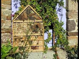 Homemade Deluxe Insect Hotel From Repurposed Wood Project Insect Hotel Organic Gardening Organic Gardening Tips