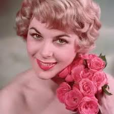 Dorothy and Toto fall asleep in the deadly poppy field from The Wizard of  Oz. Art Prints, Posters & Puzzles from Mary Evans