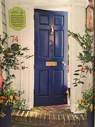 It's a deep, rich, gorgeous blue with just the slightest hint of teal in it. Door In Gentleman S Gray By Benjamin Moore Painted Front Doors Front Door Paint Colors Entrance Decor