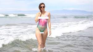 At the Beach Wearing Only Body Paint - YouTube