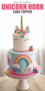 Cake covered in white fondant; How To Make A Unicorn Horn Cake Topper Video Tutorial Rose Bakes