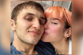The album peaked at number three on the uk albums chart, and yielded eight singles, including be the one, idgaf, and the uk number. Dua Lipa Reveals Orange Hair In Cute Quarantine Snap With Boyfriend Anwar Hadid London Evening Standard Evening Standard