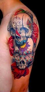 Day of the dead tattoos with roses. Celebrate The Day Of The Dead With Sugar Skull Tattoos Ratta Tattooratta Tattoo