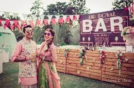 Hitched And Clicked Couple At Their Sundowner Mehendi Party Cocktail Party Decor Pre Wedding Party Indian Wedding