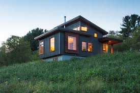 Curved shed roof with standing seam panels on a ranch home. Skillion Roof Ideas Photos