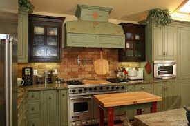 Photo by copper sky renovations or you might find you like the color so much you're willing to splurge and treat it like a neutral and use it lavishly throughout the room. Country Green Kitchen Landhausstil Orange County Von Pacific Coast Custom Design