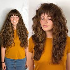 Thick beachy waves look so lovely on slightly messy short hair. 23 Perfectly Flattering Long Hairstyles With Bangs Stylesrant