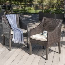 Antioch Outdoor Wicker Dining Chairs With Water Resistant Cushions Set Of 2 Wicker Dining Chairs Outdoor Dining Chairs Patio Rocking Chairs