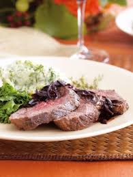Red wine reduction with beef tenderloin. Recipe Roasted Beef Tenderloin With Caramelized Shallots And Red Wine Sauce