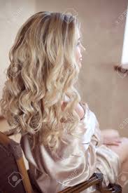 The lads's undercut haircut is a trendy type built on the brief sides, lengthy top idea that creates a cool, classy search for all guys. Healthy Hair Curly Long Hairstyle Back View Of Blond Hairs Hair Styling Wedding Day Bride Stock Photo Picture And Royalty Free Image Image 61533879