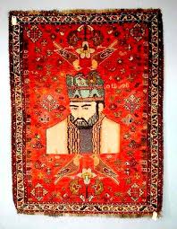 portrait and figural style kerman rugs
