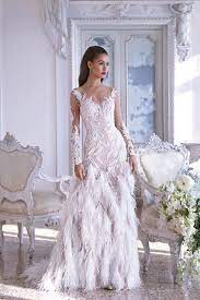 Style Dp382 Estelle Decadent Lace And Feathers Are The Focal Point Of This Stunning Fit N Flare Go Wedding Dresses Wedding Dress With Feathers Bridal Dresses