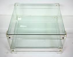 There are scuffs, scrapes, and wear to the finish. Vintage Lucite Glass Coffee Table 1970s 85432