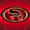 The original 49ers logo was a mustached 49er gold miner from the 1849 california gold rush, dressed in plaid pants and a red shirt, jumping in midair with his hat falling off, and firing pistols in each hand: 1