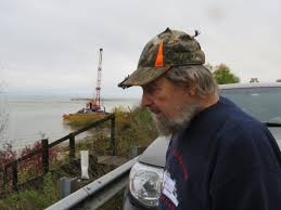 Barge pulled onshore and owner goes to court