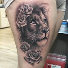 When tattooed with certain flowers the lion represents a balance. Lion Tattoos For Females On Thigh Novocom Top