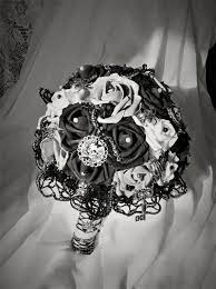 Of course, you can never go wrong with black, like these calla lilies. Skull And Roses Wedding Bridal Bouquet Dark Wedding Flower Bouquet Black Bouquet Bronze Bouquet Gray Bouquet Bride Bouquet Gothic Halloween Wedding Bridal Bouquets Wedding Flowers Flower Bouquet Wedding