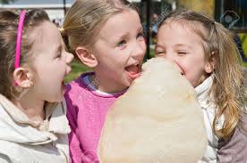 Little Girls Eating Candy-floss In The Park Stock Photo, Picture and  Royalty Free Image. Image 11849821.