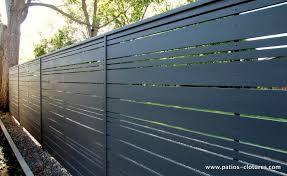 Horizontal Fence With Alternate Openwork Style Patios Et Clotures Beaulieu In 2020 Horizontal Fence Fence Styles Grey Fences
